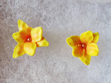 Load image into Gallery viewer, A pair of yellow and orange daylily earrings.
