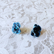 Load image into Gallery viewer, Blue and black flower shaped earrings with blue metallic centers

